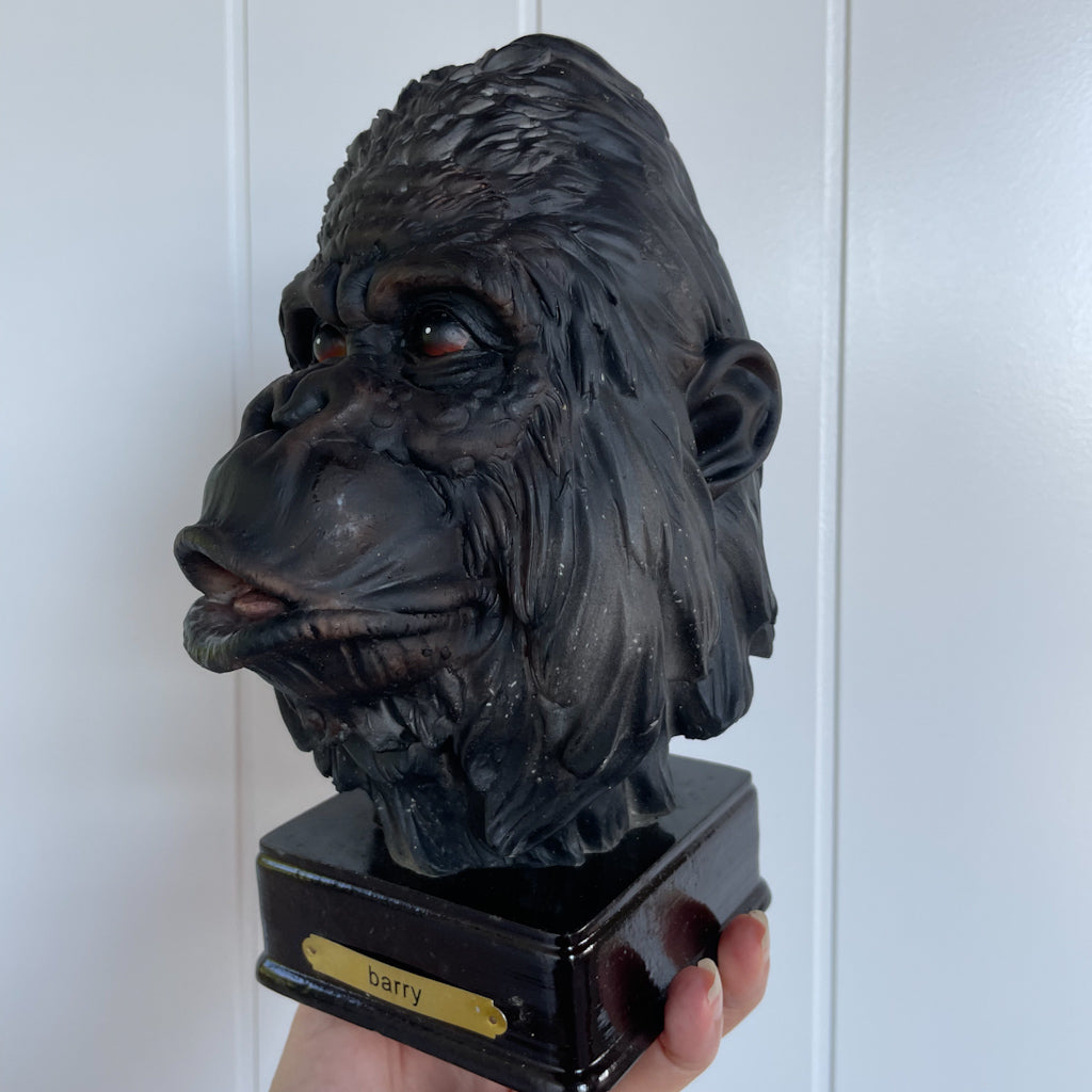Antique collector gorilla statue