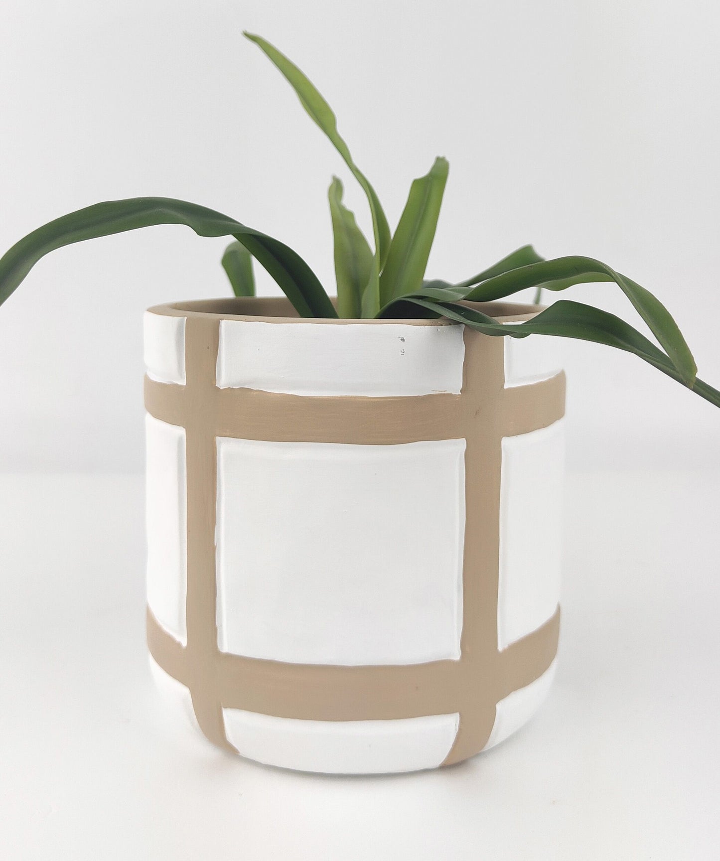 Checkered clay pot planter