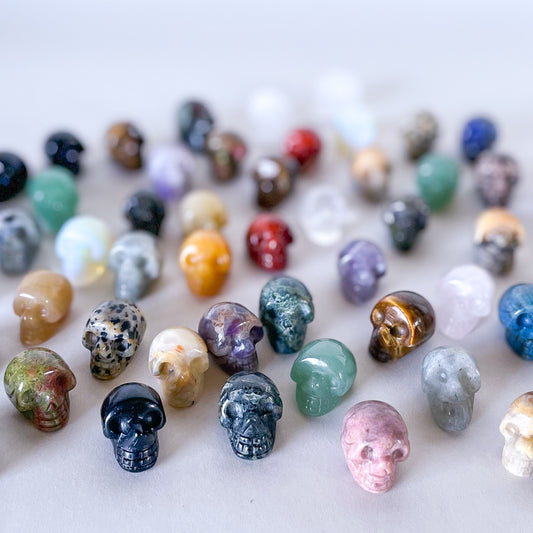 Hand carved crystal skull - mini skullie polished stone
