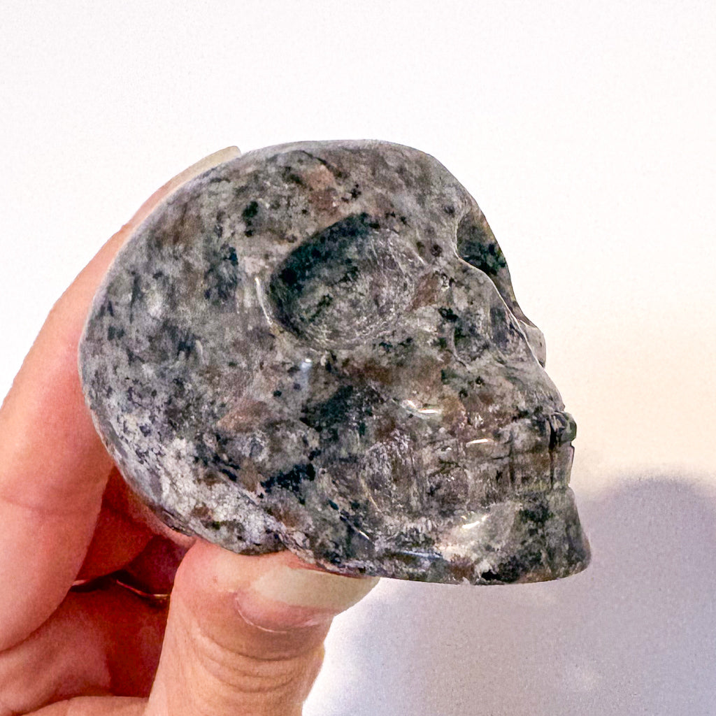 Crystal UV reactive Yooperlite polished skull
