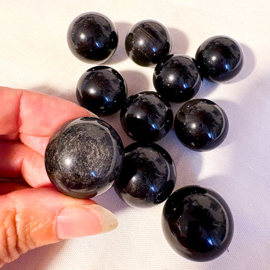 Silver sheen obsidian sphere