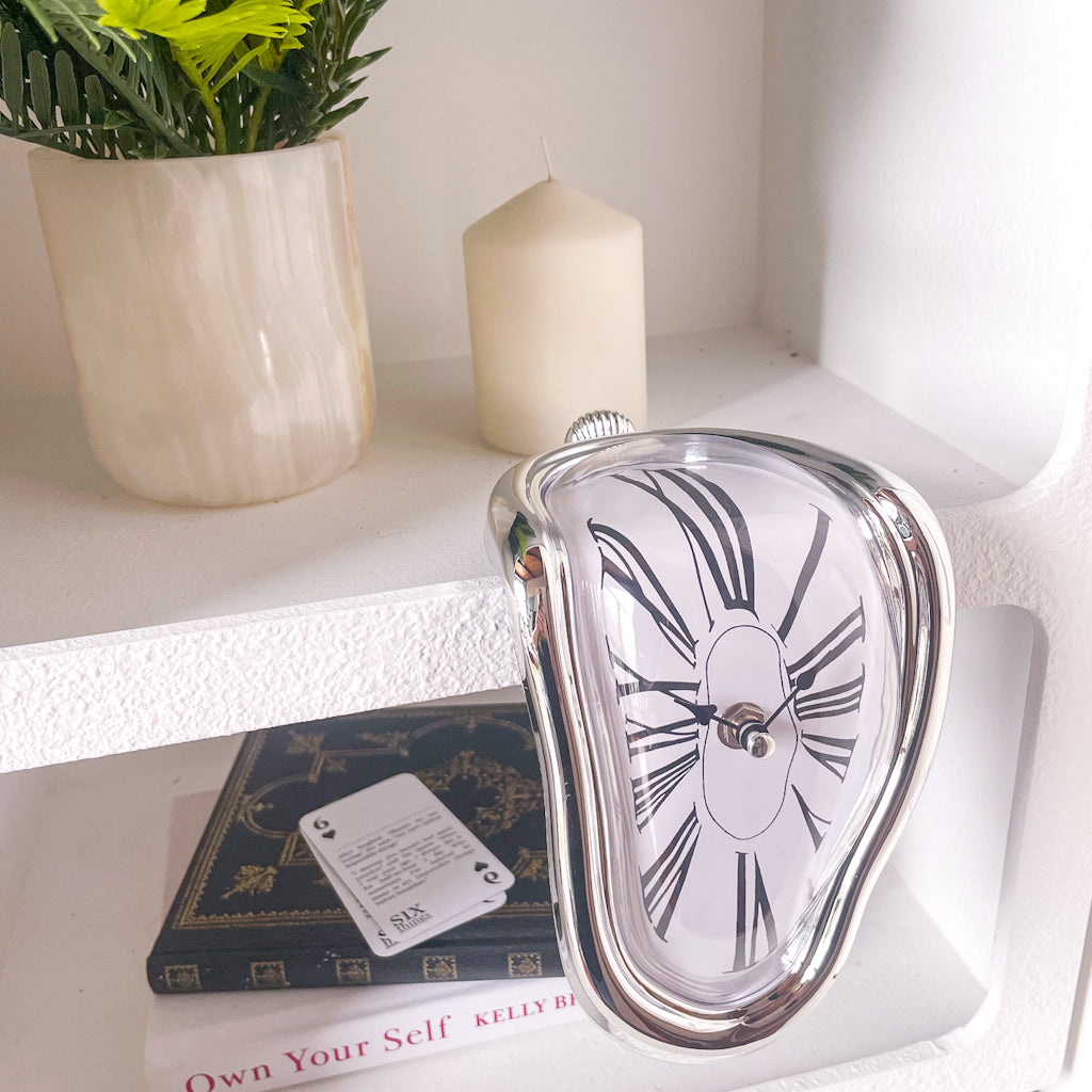 Dali / Alice in wonderland melting clock statue