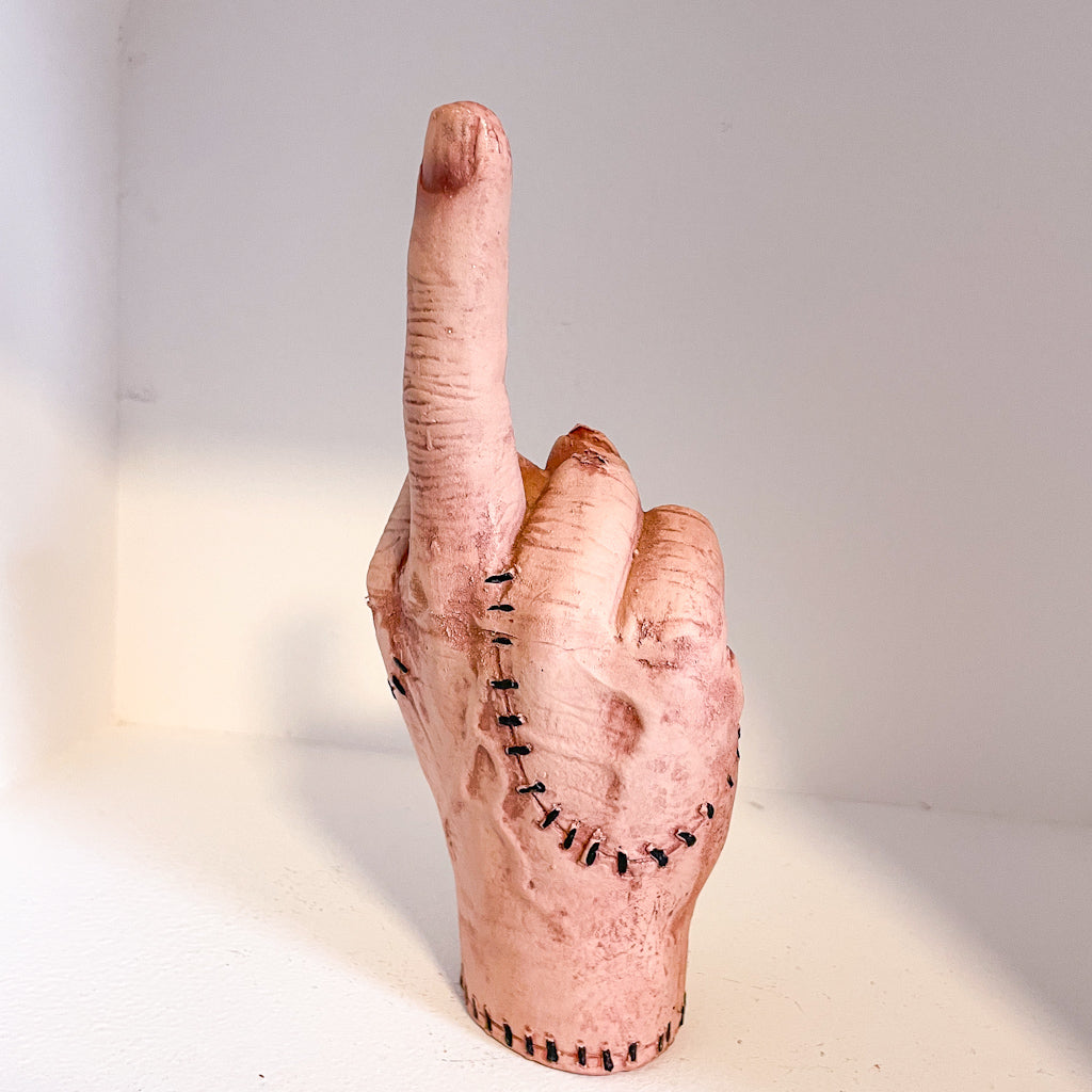 Addams family movie Thing hand rude finger