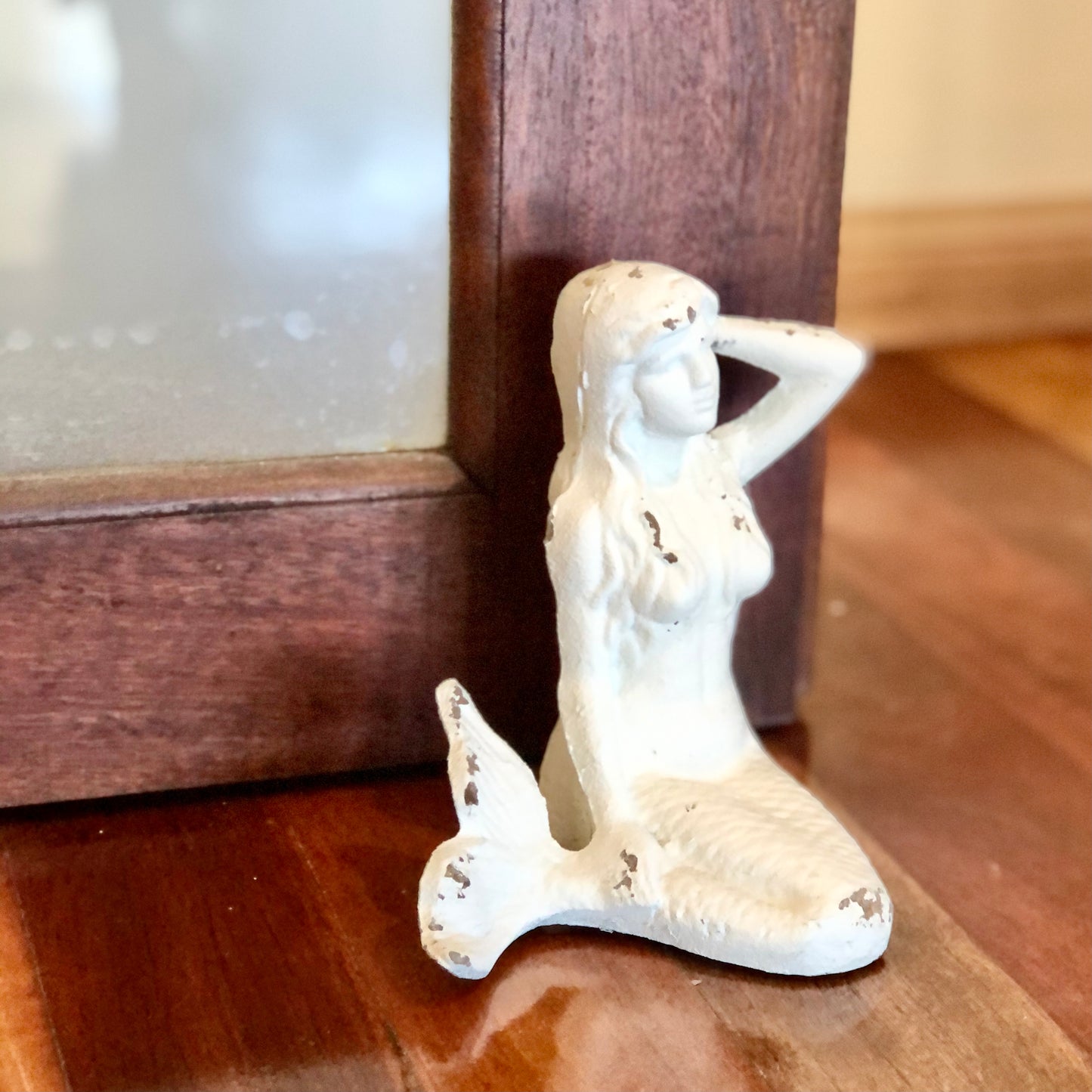 White wash cast iron mermaid door stop