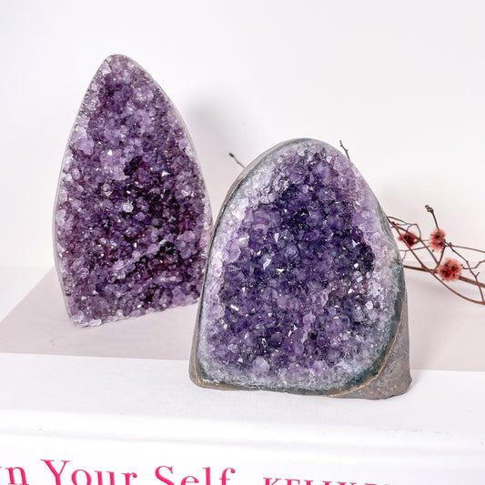 Polished edge amethyst crystal cluster cut base