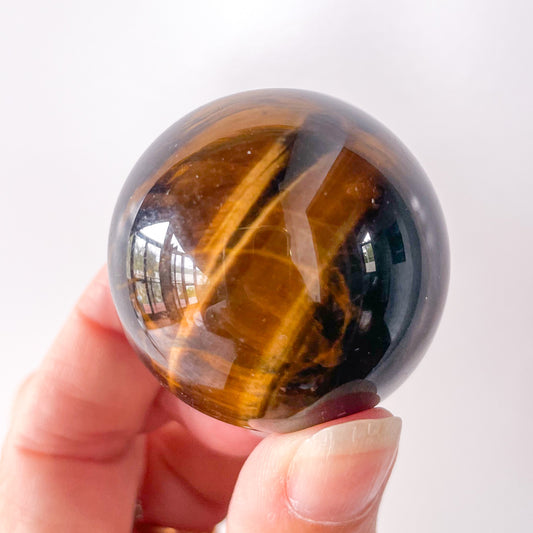 Tiger eye crystal sphere