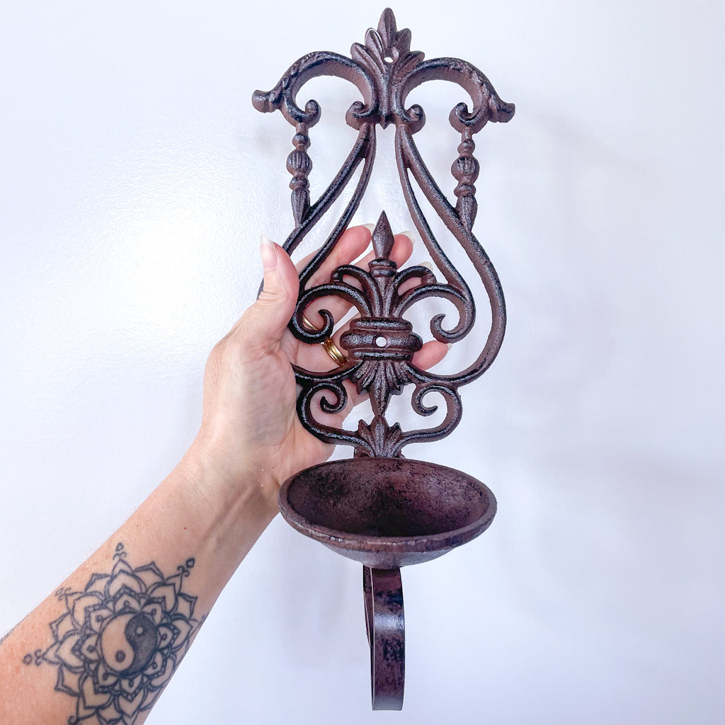 Cast iron vintage wall hanging candle holder