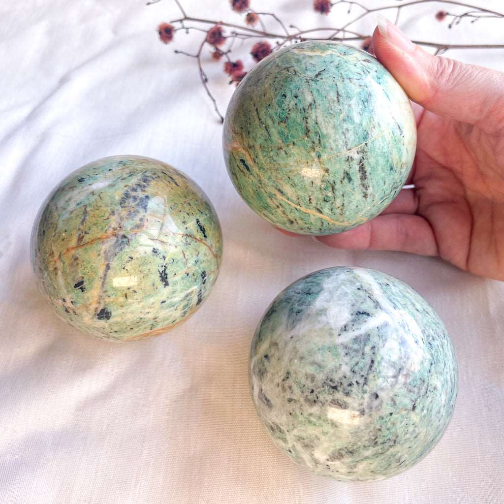Amazonite, tourmaline and smoky quartz crystal sphere