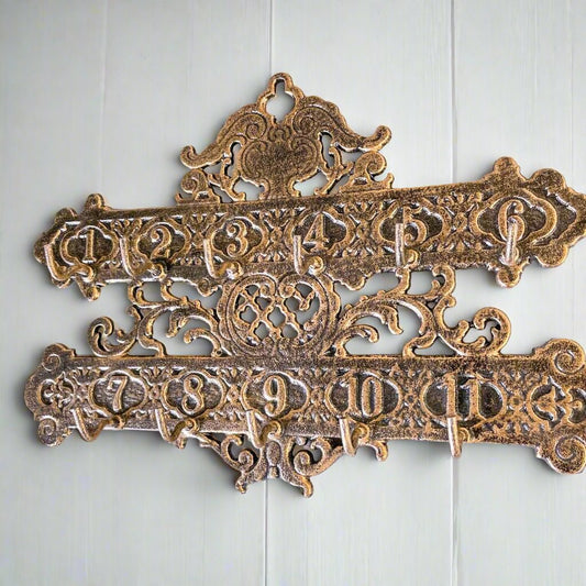Cast iron ornate hotel key numbers vintage wall hooks