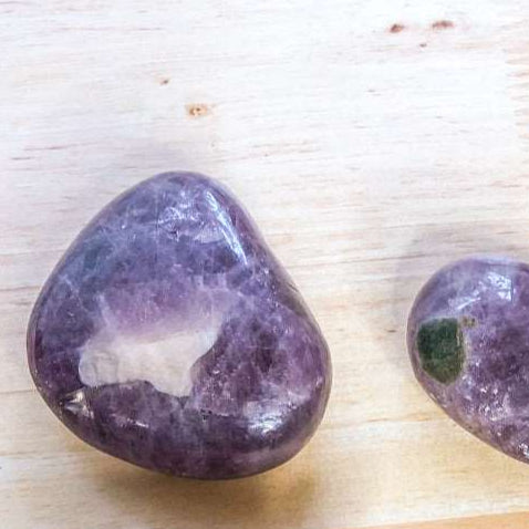 Aqua amazonite or purple anhydrite crystal palm stone