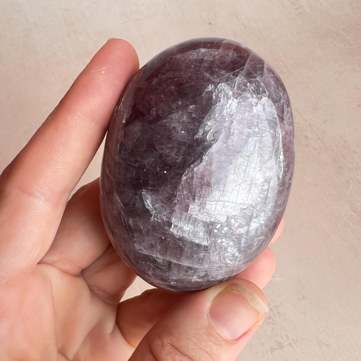 Rare purple anhydrite crystal palm stone