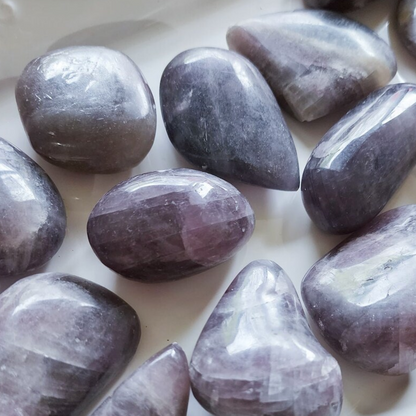 Rare purple anhydrite crystal palm stone