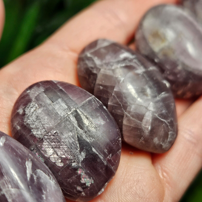 Rare purple anhydrite crystal palm stone