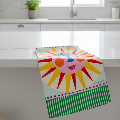 Colorful sun design with a face tea towel