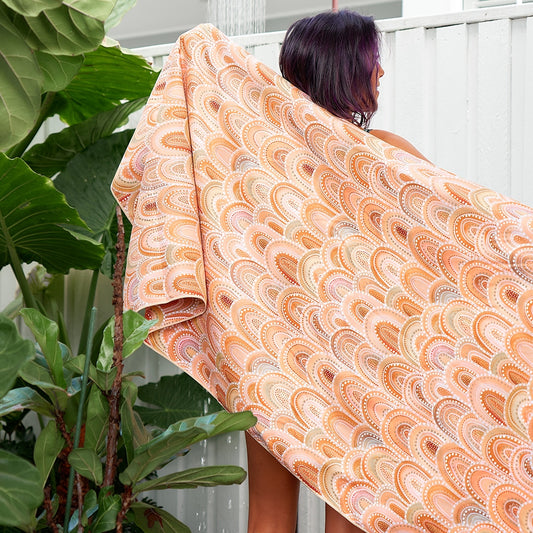 Peachy rainbows sand free towel