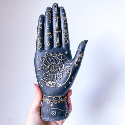 Sun moon zodiac palm hand statue
