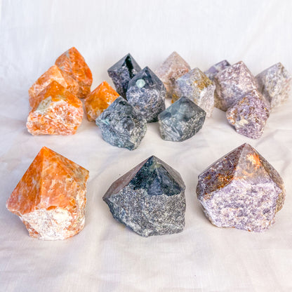 Polished top cut base crystal point - various