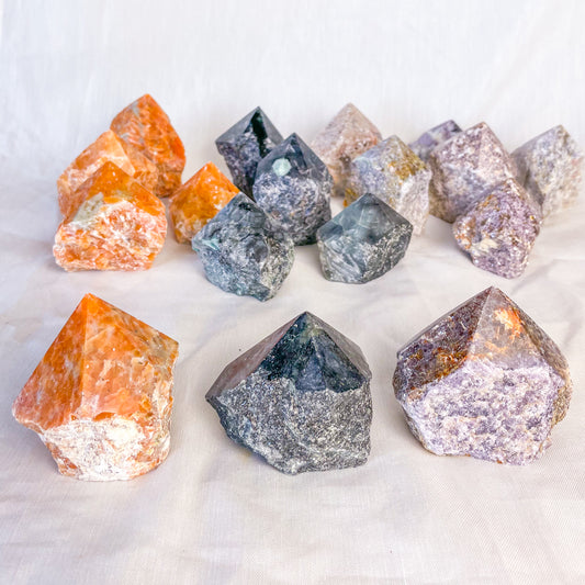 Polished top cut base crystal point - various