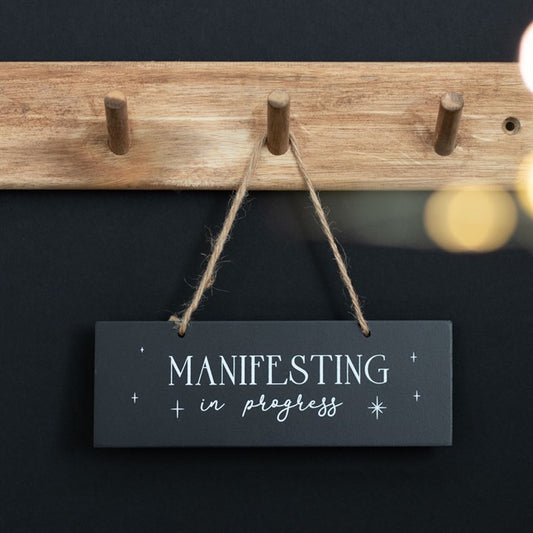 Witches manifest hanging sign