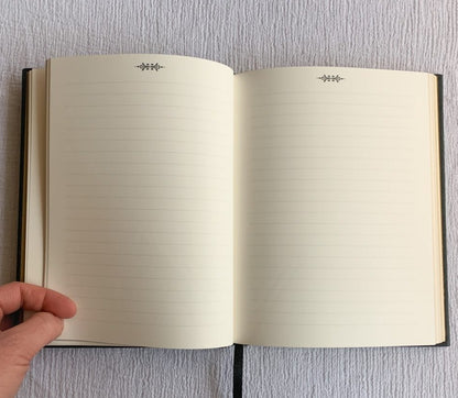 Hard cover black gold embossed journal